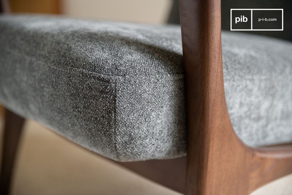 The grey velvet upholstery adds a note of softness and elegance