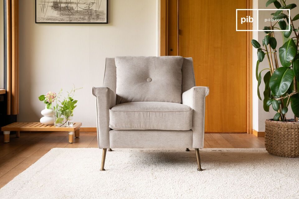 The Elbrouz grey velvet armchair stands out with its 50s-inspired design