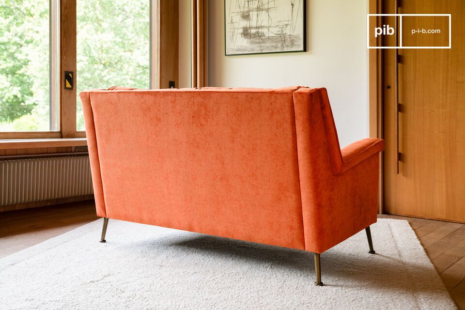 The Elbrouz orange velvet 2-seater sofa embodies the charm of the 50s with its refined geometric