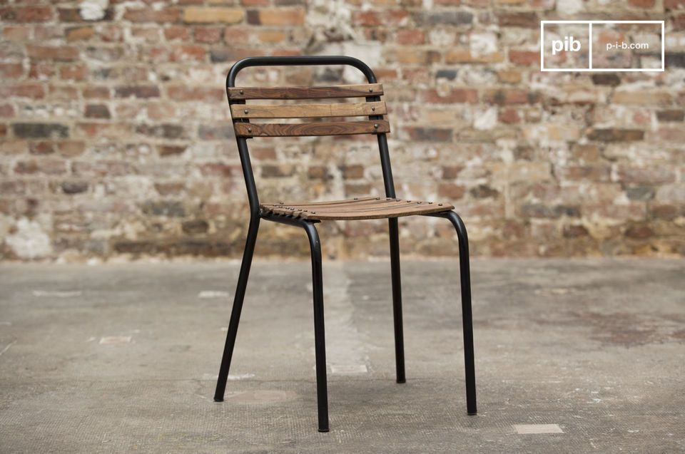 Beautiful wooden and metal chair in industrial style.